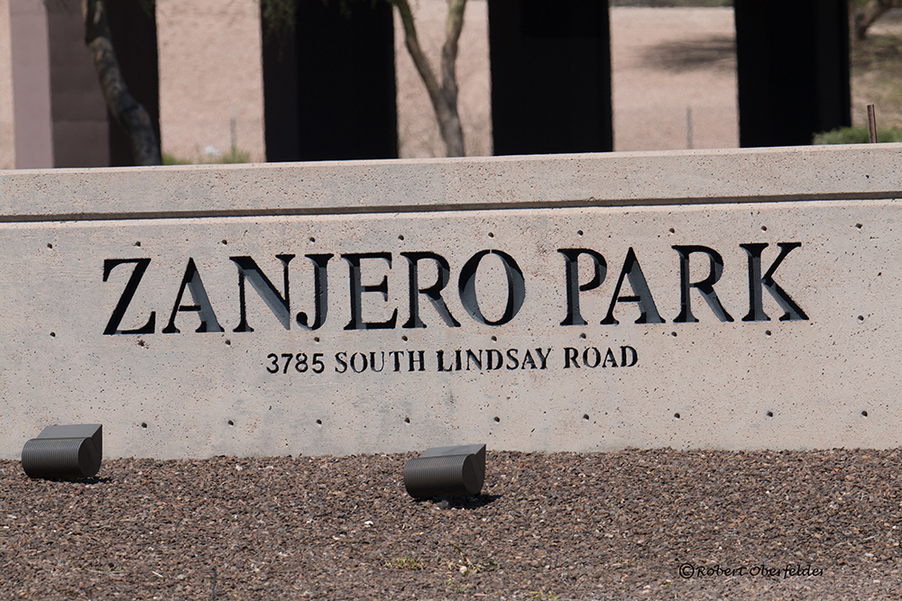 The entrance sign to this park which sits right next to the 202 Loop Highway.